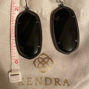Kendra Scott earrings.